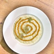 Risotto mantecato al taleggio con crema di zucca e cialda croccante